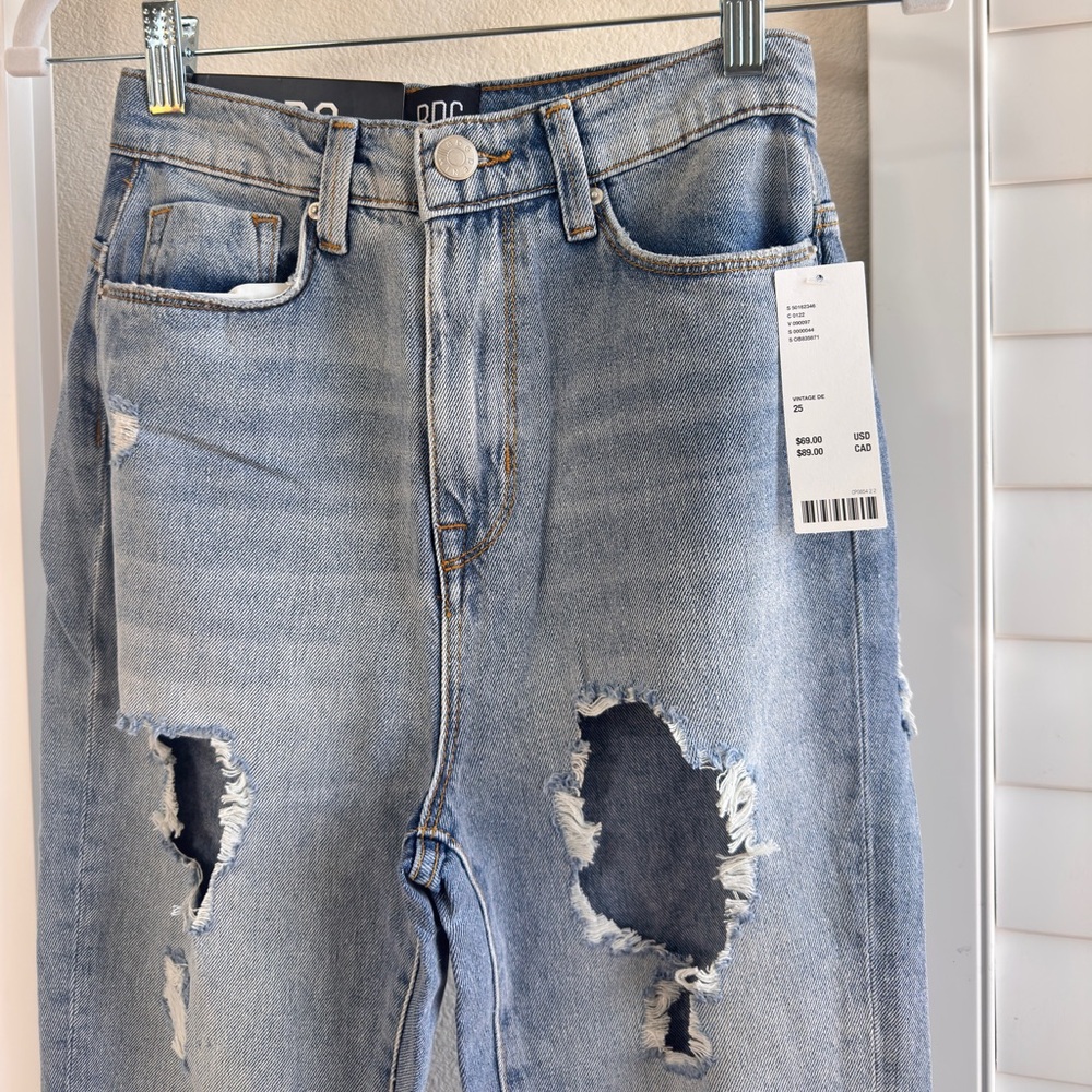 Urban outfitters. Size 25. Blue Mom High Rise Distressed Denim Jeans